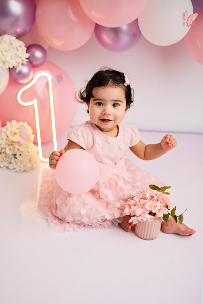 baby girl looking at the camera at Ola Molik Photography studio