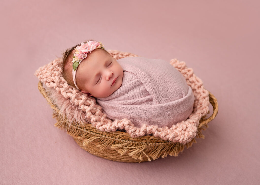 Glasgow newborn photography – baby sleeping wrapped in neutral blanket