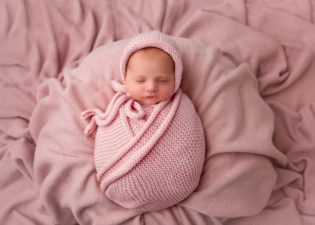 Glasgow newborn photography – baby sleeping wrapped in neutral blanket