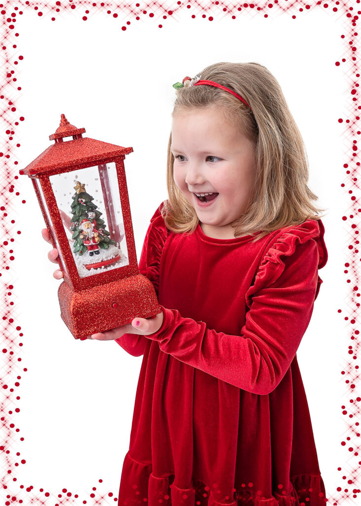 Little girl looking at the Santa during her Christmas Photoshoot with Ola Molik Photography