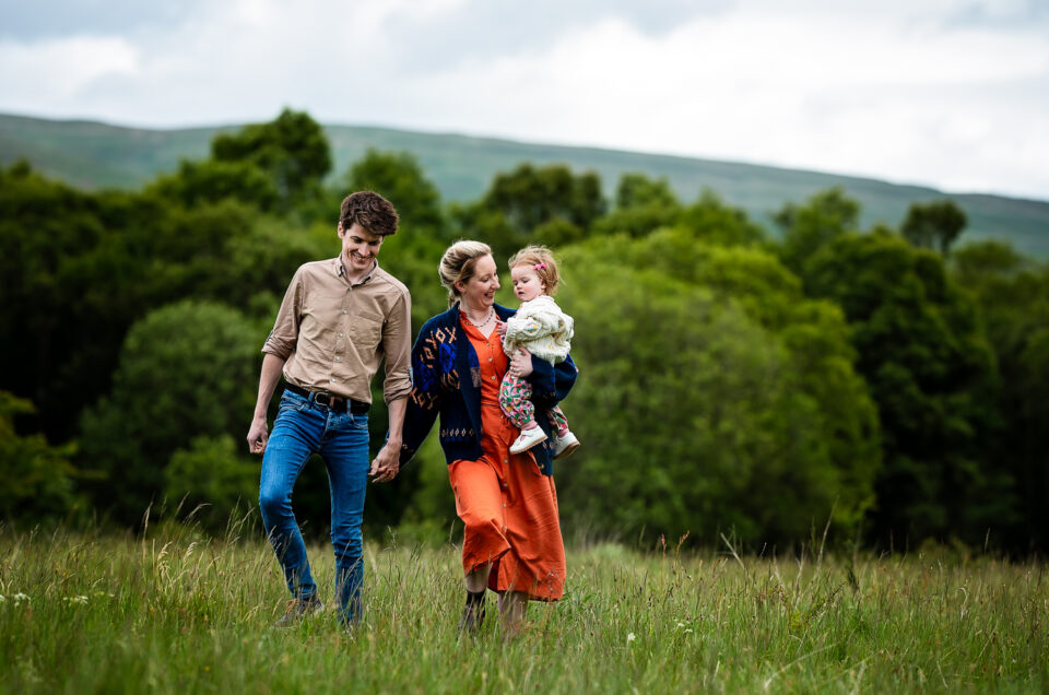 Family taking a walk at Mugdock Park during their family photoshoot with Ola Molik Photography