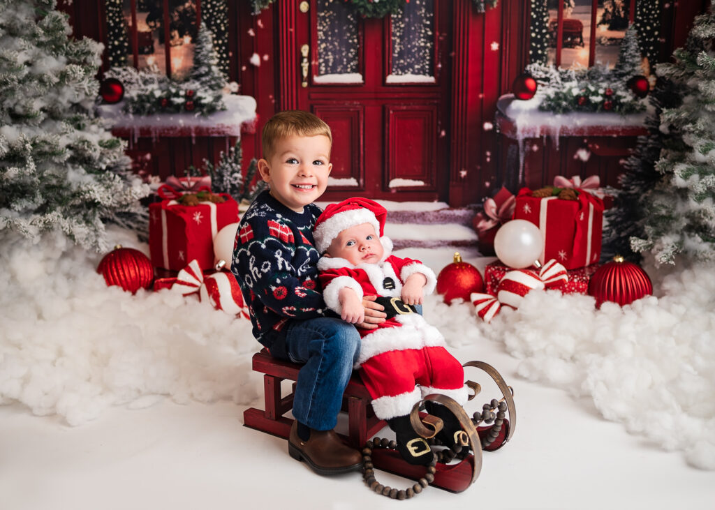 Brothers posing  for a photographer Ola Molik Photography during their winter mini photoshoot in Glasgow