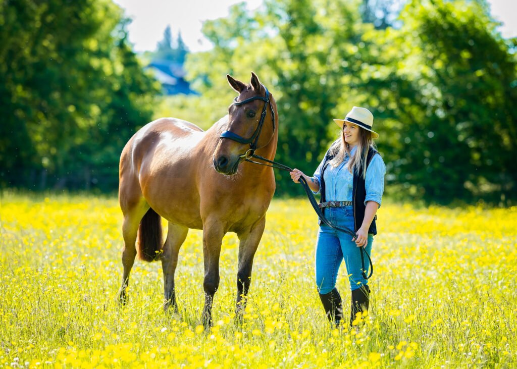 horse and his owner looking at the camera