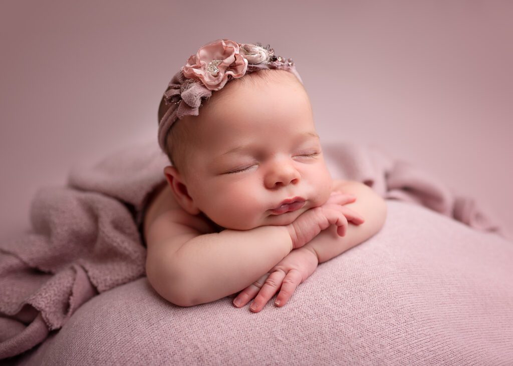 Newborn Photography Scotland – Beautiful baby girl during a professional newborn photoshoot in Glasgow with timeless family portraits.