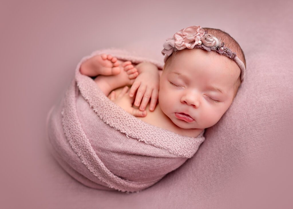 Newborn Photography Scotland – Beautiful baby girl during a professional newborn photoshoot in Glasgow with timeless family portraits.